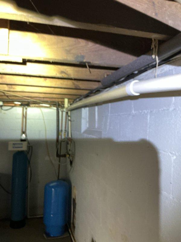 Responded to a dishwasher backing up into the kitchen sink. Upon inspection of the basement plumbing system, identified and cleared a drainage obstruction affecting the dishwasher discharge line. Verified proper water flow through all drain connections and confirmed the issue was resolved with no further backup occurring.