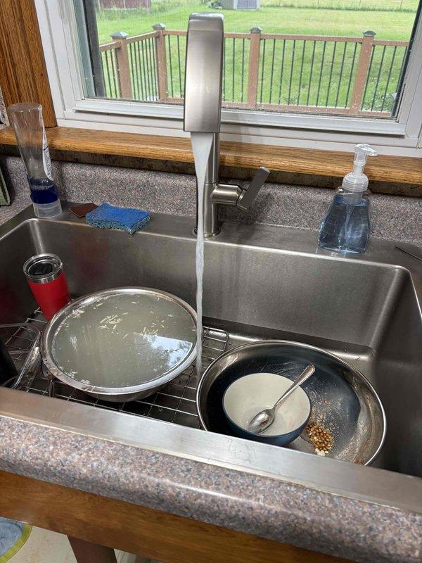 Returned to complete proper repair and upgrade of previous plumbing work performed on kitchen sink drainage system. Inspected under-sink plumbing configuration including P-trap assembly, garbage disposal connections, and drain lines to ensure all components meet code requirements. Verified proper water flow and tested for leaks at all connection points to confirm system integrity.