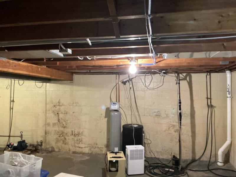Performed estimate evaluation for adding a draft inducer blower to an existing 6-year-old Lochinvar water heater installed in basement utility area. Assessed current venting configuration, clearances, and mechanical room layout to determine feasibility of blower installation. Documented existing equipment conditions and provided recommendations for proper combustion air management system integration with HRV system already present in the space.