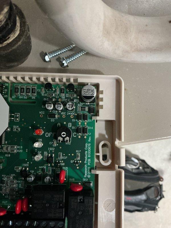 Responded to water panel alert light blinking on newly installed Aprilaire humidifier. Inspected control board and wiring connections, verified proper installation of circuit board components and relay operation. Removed and reseated control board to ensure secure mounting and proper electrical contact at all connection points. Tested system operation, confirmed heating and cooling functions operating normally, and verified alert light resolved after board reinstallation. System returned to normal operation with no further issues detected.