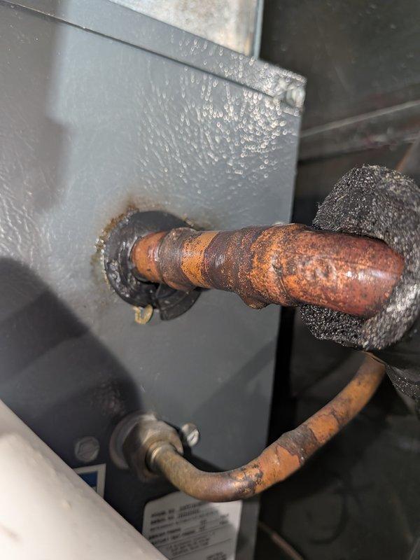 Completed annual cooling maintenance on a 7-year-old Goodman AC system. Performed standard tune-up procedures including inspection of all accessible components, refrigerant line assessment, and airflow verification at supply registers. Documented significant corrosion observed on copper refrigerant lines at coil penetration point through air handler cabinet, indicating potential moisture exposure and age-related deterioration requiring future monitoring.