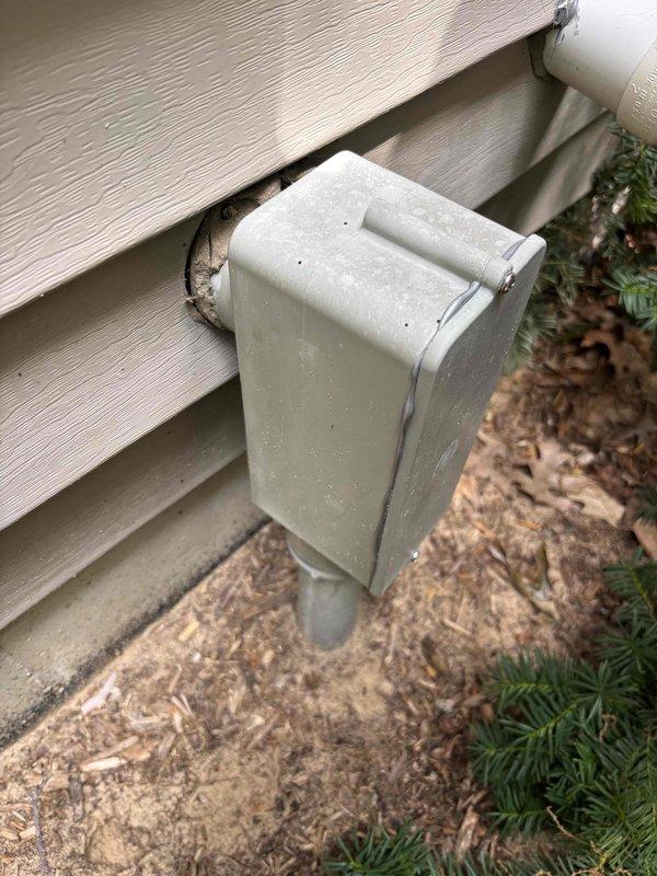 Responded to repeat service call for non-functional thermostat on 23-year-old Bryant system. Upon arrival, traced issue to exterior low-voltage wiring compromise at outdoor junction box where conduit enters HVAC disconnect. Found exposed wiring connection point had deteriorated due to weather intrusion through gap between utility box and siding, causing intermittent thermostat communication failure. Secured all low-voltage connections, verified proper thermostat operation, and recommended sealing exterior penetration to prevent future moisture-related failures.