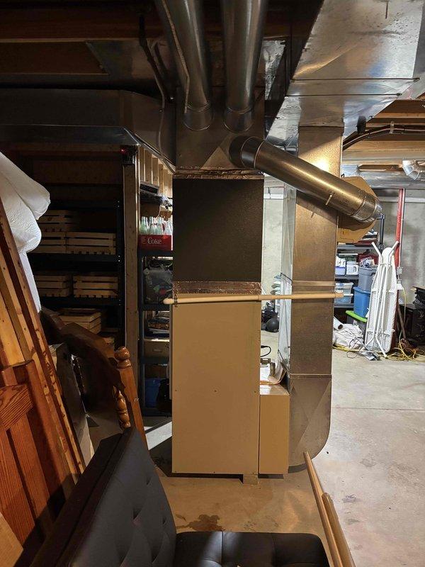Successfully completed full air conditioning system replacement in basement utility area. Removed existing AC unit and installed new Lennox system with proper ductwork connections, including metallic plenum assembly and insulated supply ducts. Configured PVC condensate drain lines and venting according to manufacturer specifications. Verified all electrical connections, tested system operation, and ensured proper airflow throughout the distribution network. Installation includes complete labeling per code requirements and integrated seamlessly with existing furnace infrastructure.
