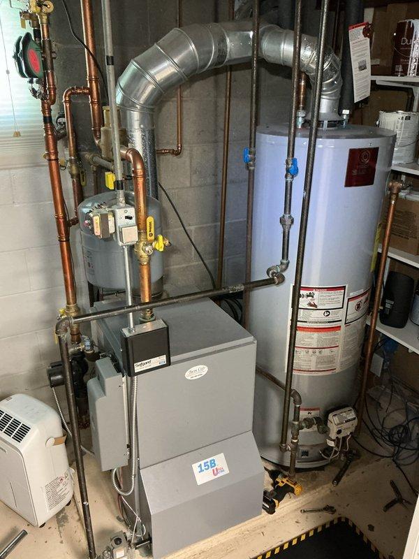 Completed burner assembly replacement on residential tank-style water heater. Removed failed burner assembly and installed new unit, ensuring proper gas connections and combustion air supply. Tested all safety controls including thermocouple, gas valve operation, and temperature/pressure relief valve. Verified proper ignition sequence and flame characteristics. Restored hot water service to full operational capacity with all components functioning within manufacturer specifications.
