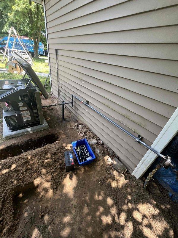Successfully installed a 26KW Kohler standby generator with 100A service at residential property. Coordinated utility disconnect and reconnect services, obtained electrical permit PEMR26-0019, and completed all required inspections. Generator unit was positioned on concrete pad adjacent to existing HVAC equipment with proper clearances, electrical conduit was run and secured to exterior wall, and service upgrade was completed to accommodate the new load.