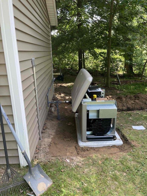 Successfully installed a 26KW Kohler standby generator with 100A service at residential property. Coordinated utility disconnect and reconnect services, obtained electrical permit PEMR26-0019, and completed all required inspections. Generator unit was positioned on concrete pad adjacent to existing HVAC equipment with proper clearances, electrical conduit was run and secured to exterior wall, and service upgrade was completed to accommodate the new load.
