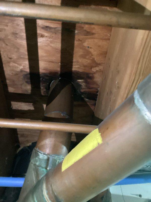 Responded to plumbing leak in basement. Upon inspection, identified active leak from copper supply line running through floor joists above basement ceiling. Secured leaking pipe section with proper support strapping and applied temporary insulation to affected area to prevent further water damage. Verified leak was contained and advised customer of repair completion.