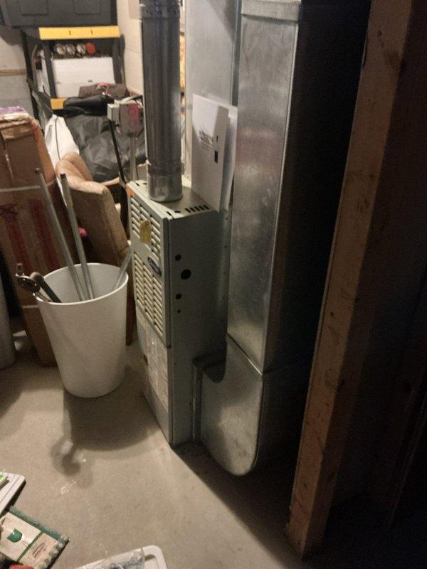 Conducted comprehensive estimate for HVAC system upgrade involving replacement of two existing air conditioning units and installation of two additional AC systems. Assessed current basement equipment including existing Bryant furnace and air handling systems mounted on concrete block foundations. Evaluated ductwork configuration, electrical requirements, and spatial considerations for expanded cooling capacity. Documented existing mechanical systems and infrastructure to determine scope of work for replacing current AC units and adding supplementary cooling zones. Photographed equipment layout, ductwork routing, and installation areas to support proposal development for complete system enhancement.