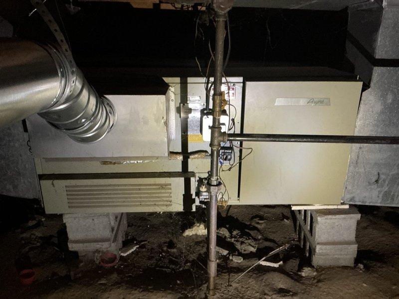 Conducted comprehensive estimate for HVAC system upgrade involving replacement of two existing air conditioning units and installation of two additional AC systems. Assessed current basement equipment including existing Bryant furnace and air handling systems mounted on concrete block foundations. Evaluated ductwork configuration, electrical requirements, and spatial considerations for expanded cooling capacity. Documented existing mechanical systems and infrastructure to determine scope of work for replacing current AC units and adding supplementary cooling zones. Photographed equipment layout, ductwork routing, and installation areas to support proposal development for complete system enhancement.