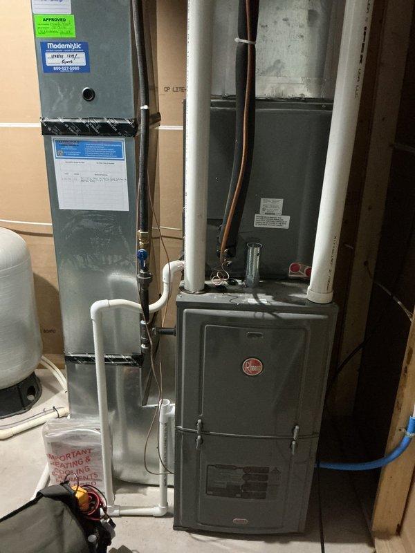 # Furnace Blower Motor Failure - No Heat

Responded to service call for 10-year-old Rheem furnace with reported blower fan failure resulting in complete loss of heating and cooling capability. Upon arrival, performed system diagnostic and confirmed blower motor was non-operational. Inspected furnace control board and verified proper voltage supply to motor circuit. Determined blower motor had failed and required replacement. Removed failed motor assembly, installed new OEM-equivalent blower motor, and reconnected all electrical connections. Tested furnace operation through complete heating cycle, verified proper airflow at supply registers, and confirmed thermostat communication with control system. System restored to full operational status with proper heating function.