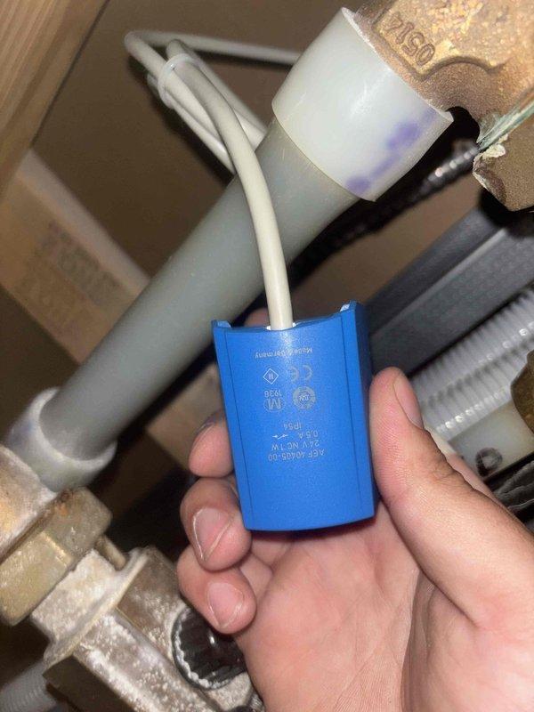 Replaced floor zone valves and valve stem on hydronic heating system. Installed new zone valve actuators with capacitors and coupling components to restore proper zone control operation.