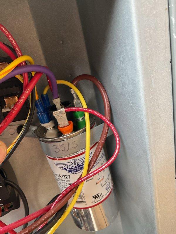Responded to air conditioning system not cooling to setpoint. Upon inspection, found failed dual run capacitor preventing compressor and condenser fan motor from operating properly. Replaced defective capacitor with manufacturer-approved component, verified proper microfarad ratings, and tested system operation. Unit now cooling effectively with all electrical connections secure and components functioning within normal parameters.