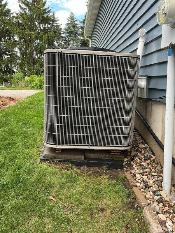 Completed annual cooling maintenance on 11-year-old residential air conditioning system. Performed comprehensive inspection of outdoor condenser unit, verified proper operation of all electrical components and connections, checked refrigerant levels and pressures within manufacturer specifications, cleaned condenser coils, inspected condensate drain line and PVC piping for proper drainage, and confirmed unit cycling and performance meet operational standards.