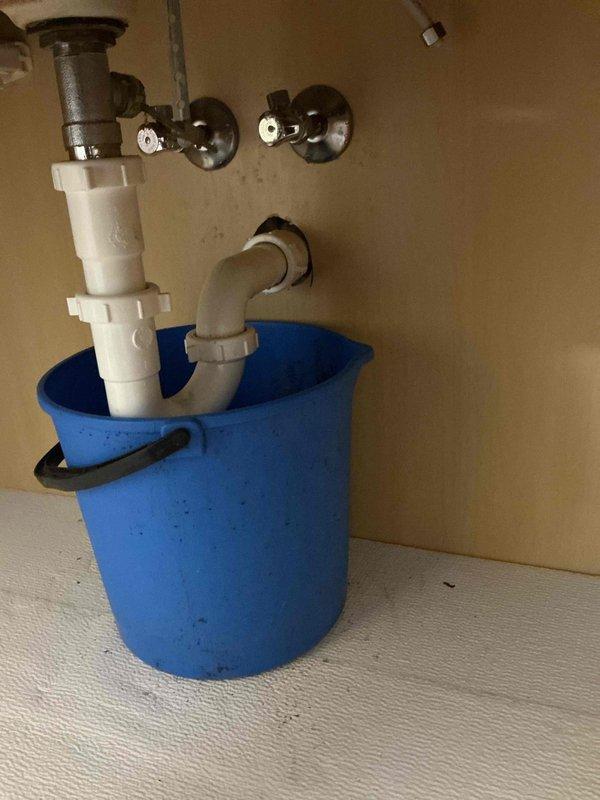 Responded to water leak at upstairs bathroom sink shut-off valve. Upon arrival, found chrome angle stop valve actively leaking and unable to fully close, causing continuous water discharge. Shut off main water supply, removed defective angle stop valve, and installed new chrome-finished replacement valve with proper sealing. Reconnected supply line, restored water service, tested valve operation through multiple open/close cycles, and confirmed complete stoppage of leak with no further dripping or water discharge.
