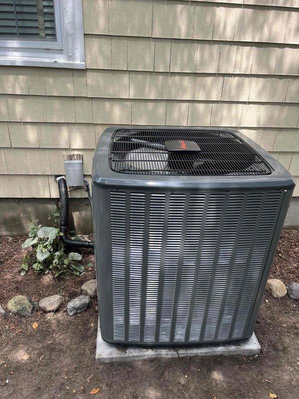 Completed full air conditioning system replacement including outdoor Trane condenser unit and indoor furnace equipment. Installed new outdoor condenser on concrete pad with proper clearances, connected refrigerant lines, and established condensate drainage system with PVC piping. Indoor installation included integration with existing ductwork using flexible connections, electrical conduit routing, and proper labeling of all safety specifications. All equipment tested and verified operational upon completion.