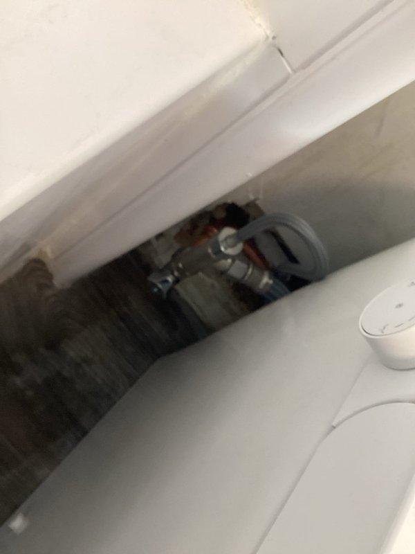 Relocated toilet water supply line to accommodate proper toilet positioning and replaced worn toilet flange to ensure secure mounting and prevent future leaks. Adjusted flange height to align flush with new flooring surface, completing installation with proper sealing to maintain watertight integrity.