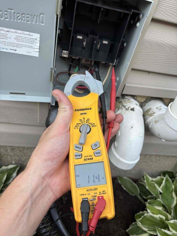 # NC-No Cool Service Completed

Responded to no cooling call for air conditioning unit not turning on. Upon arrival, performed electrical diagnostics at outdoor disconnect box. Used clamp meter to measure amperage draw, recording readings of 1.14A and 7.8A at the electrical panel and contactor. Inspected electrical connections, circuit breakers, and contactor operation within the outdoor disconnect. Verified power supply to unit and checked for proper voltage and current flow through the system components.