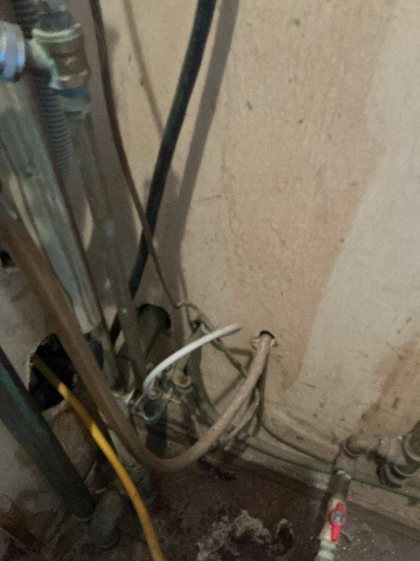 Completed new water softener installation in 50-year-old residential property. Installed unit in basement utility area with proper connections to existing plumbing infrastructure. Routed supply and drain lines, integrated electrical connections, and ensured all fittings were properly secured and sealed. System was tested for proper operation and water flow. All installation work performed to code specifications with minimal disruption to existing mechanical systems.