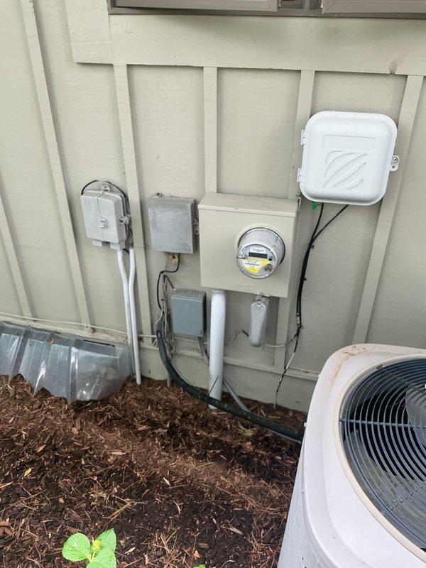 Conducted comprehensive site evaluation for air conditioning system installation and electrical panel upgrade. Assessed existing exterior electrical infrastructure including meter base, disconnect switches, and conduit routing, as well as interior electrical panel with current circuit breaker configuration and available capacity. Documented existing conditions and provided detailed estimate for panel upgrade to accommodate new AC system load requirements.