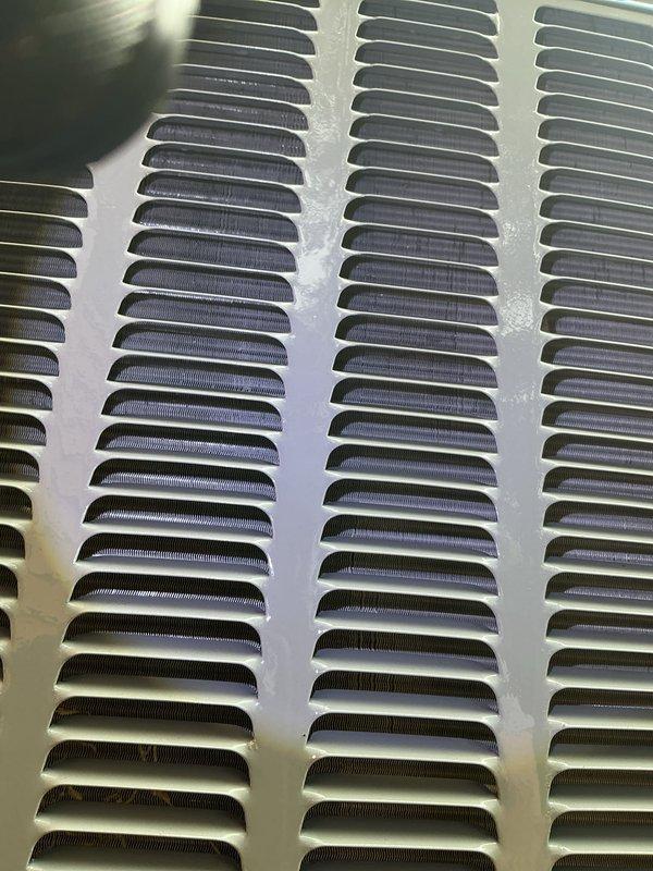 Completed annual cooling maintenance on 2016 EnergiAir system under 4-year warranty coverage. Performed comprehensive inspection of unit interior, noting normal condensation accumulation in drain pan with properly functioning float switch. Inspected refrigerant lines with insulation intact and secure cable ties. Examined evaporator coil fins, confirming clean condition with uniform spacing and no blockage. All components operating within normal parameters with no deficiencies found requiring immediate attention.