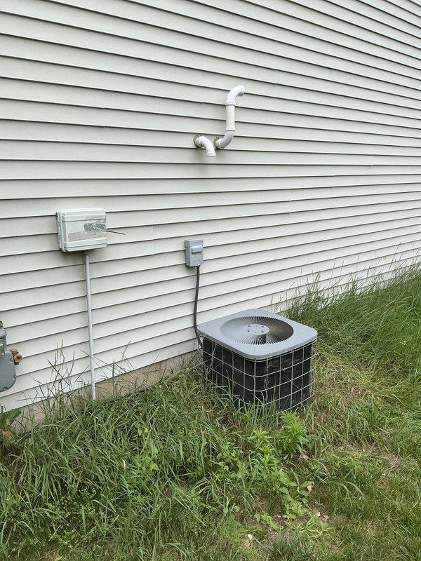 Performed AC tune-up on residential split system with Granpids furnace and outdoor condenser unit. During inspection, identified near-failed run capacitor on condensing unit, indicating imminent system failure risk. Advised client that existing equipment reliability is compromised due to age and component wear. Provided estimate for complete system replacement and discussed financing options to address equipment concerns.