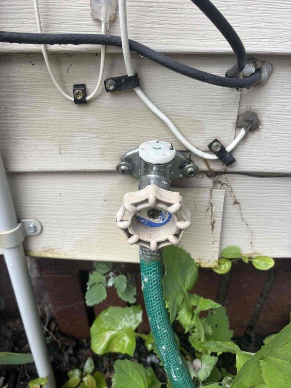 Performed preventive maintenance on mini-split system, including thorough cleaning of indoor unit housing and internal components which showed significant dust and debris accumulation. Inspected and assessed exterior line set insulation and wiring coating at outdoor connection point, noting weathering and exposure damage. Replaced deteriorated protective coating around refrigerant lines and electrical wiring to restore proper insulation and weather protection, ensuring system integrity and compliance with manufacturer specifications.