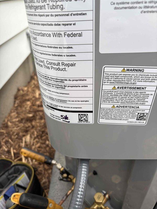 Completed full HVAC system installation including new furnace and air conditioning condenser unit. Installed outdoor condenser on concrete pad with proper refrigerant line connections, electrical disconnect box, and insulated line set penetrating exterior wall. All equipment positioned per manufacturer specifications, refrigerant lines properly secured and insulated, electrical connections completed and verified operational.