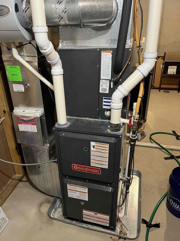 Completed annual cooling maintenance on 10-year-old Goodman HVAC system. Performed comprehensive tune-up including inspection of furnace, air handler, and condensate drainage system. Verified proper operation of dual run capacitor and electrical connections. Inspected refrigerant lines with insulation and confirmed all PVC piping connections were secure. System tested and operating within normal parameters. Customer requested club membership renewal at time of visit.
