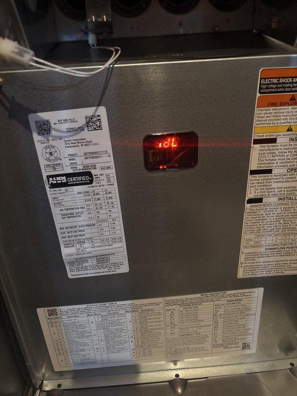Responded to no cooling complaint where system would not turn on or operate. Upon inspection, found HVAC unit displaying fault code -32 on control board, indicating a system error preventing operation. Diagnosed control board malfunction preventing system startup. Inspected electrical connections and system components, documented unit condition and fault code display. Provided customer with repair options and recommendations for restoring system operation.