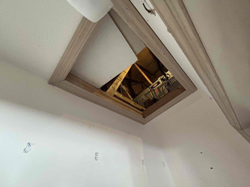 Responded to no-cool complaint on second-floor air conditioning unit over 10 years old. Accessed attic space through interior access panel to locate and inspect upstairs HVAC system. Unit found to be non-operational and unable to be restored to service at this time.