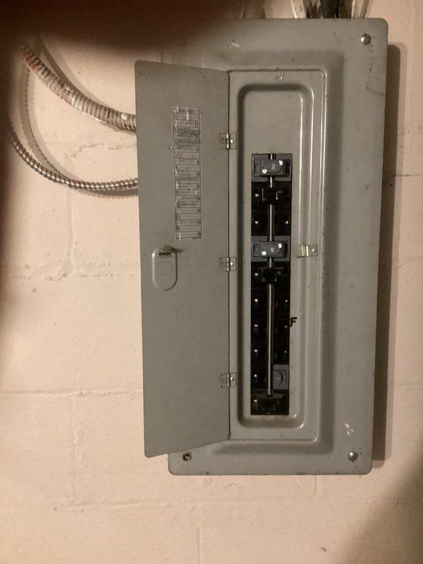 Completed estimate for new air conditioning system installation in property with no existing AC equipment. Assessed existing electrical panel and infrastructure to determine requirements for adding electrical subpanel necessary to support new AC system load. Documented current electrical configuration and available capacity for planned installation.