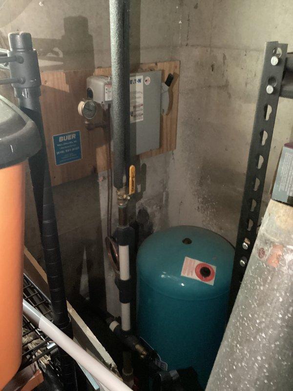 Responded to customer complaint regarding three toilets not flushing properly. Inspected all three toilet fixtures throughout the home and evaluated flush performance. Based on photographic documentation showing standard residential toilets and basement utility area with pressure tank and plumbing infrastructure, assessed water pressure and supply system. Identified potential issues with inadequate water volume or pressure affecting flush operation across multiple fixtures. Evaluated pressure tank system and associated plumbing components in mechanical room to determine if system-wide water delivery was contributing to poor flush performance. Provided customer with findings and recommendations for resolving flushing issues on all affected toilets.