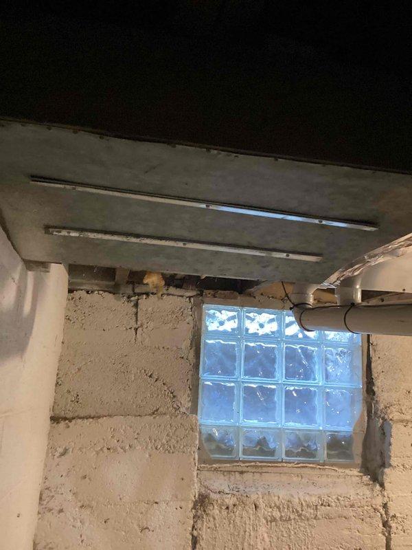 # NOISE-Noise Problem Resolution

Responded to service call for loud banging noise from newly installed Carrier furnace causing floors to shake. Accessed property using provided key code and inspected unit while running. Upon investigation, identified inadequate vibration isolation and improper mounting of ductwork connections to floor joists. Secured loose ductwork hangers and added vibration dampening supports at critical connection points where metal ductwork meets structural framing. Verified all mounting hardware was properly tightened and adjusted clearances between ductwork and building structure to eliminate contact points. Observed unit through multiple heating cycles to confirm elimination of banging noise and vibration transmission to floors. Documented installation conditions with photos showing ductwork configuration and mounting points in basement utility area. Completed wrap-up call as requested to confirm resolution of noise issue.