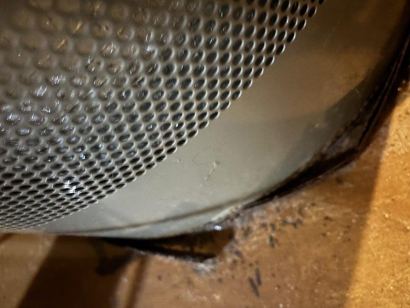Completed annual cooling maintenance on 15-year-old Payne air conditioning system. Inspected and photographed condensate pump assembly showing accumulated dust and debris on perforated filter screen; cleaned unit and verified proper drainage operation. Performed comprehensive system evaluation including refrigerant levels, electrical connections, and airflow measurements to ensure optimal performance for the cooling season.