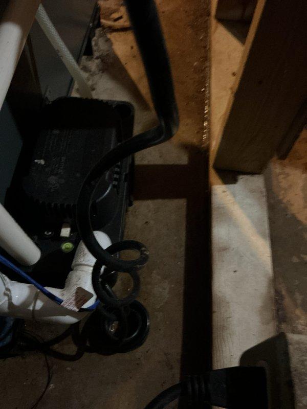 Completed annual cooling maintenance on 15-year-old Payne air conditioning system. Inspected and photographed condensate pump assembly showing accumulated dust and debris on perforated filter screen; cleaned unit and verified proper drainage operation. Performed comprehensive system evaluation including refrigerant levels, electrical connections, and airflow measurements to ensure optimal performance for the cooling season.