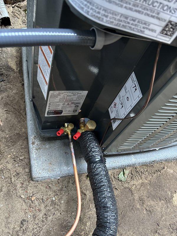 Completed full HVAC system replacement, removing existing air conditioning unit and installing new condenser on exterior concrete pad with proper refrigerant line connections and brass valve fittings. Installed new air handler with integrated control board in interior vertical shaft, running all necessary electrical wiring and connections to ensure proper system operation. Verified all refrigerant lines properly insulated, system mounted securely on foam base pad, and all manufacturer specifications met for optimal performance.