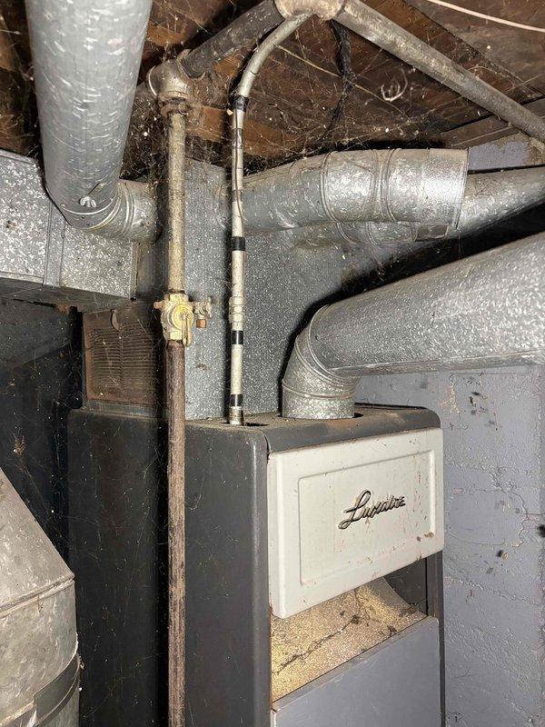 Responded to no cooling call on 10+ year old system. Found blown breaker in main electrical panel that would not reset, indicating electrical fault in AC system. Inspected basement mechanical area and ductwork connected to unit. Due to age of equipment and electrical failure requiring further diagnosis, provided assessment and recommendations to customer.