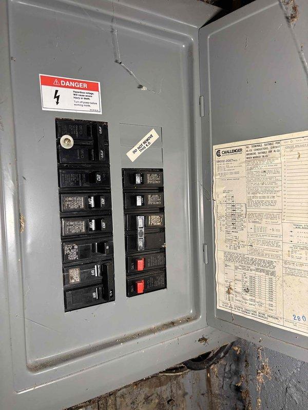 Responded to no cooling call on 10+ year old system. Found blown breaker in main electrical panel that would not reset, indicating electrical fault in AC system. Inspected basement mechanical area and ductwork connected to unit. Due to age of equipment and electrical failure requiring further diagnosis, provided assessment and recommendations to customer.