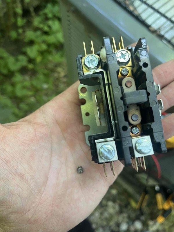 Completed annual cooling maintenance on 2019 EnergiAir unit with warranty through June 2029. Inspected and replaced faulty contactor relay showing signs of wear and discoloration on contact terminals. Verified all electrical connections at terminal blocks, checked wire integrity across control circuits, and confirmed proper operation of system components following contactor replacement.
