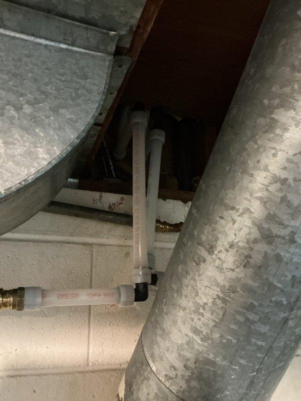 # Upstairs Bathroom Drain and Water Repipe

Completed comprehensive drain and water repipe installation for upstairs bathroom over a three-day period. Installed new PVC drainage system with proper venting configuration, including vertical stack and horizontal drain lines with code-compliant fittings and connections. Replaced existing water supply lines with new piping, securing all components with appropriate mounting brackets and hangers to floor joists. All work performed in accordance with UPC code standards, utilizing ASTM D1785-12 certified materials. System installed in crawl space area, coordinating routing around existing HVAC ductwork and structural framing to ensure proper clearances and accessibility for future maintenance.