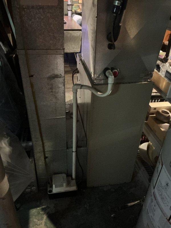 Provided comprehensive air conditioning replacement estimate for 26-year-old Amana unit that has reached end of expected service life. Documented existing HVAC system configuration in basement utility area, including current air handler setup, ductwork connections, and available installation space. Confirmed customer contact information for estimate follow-up and system replacement scheduling.