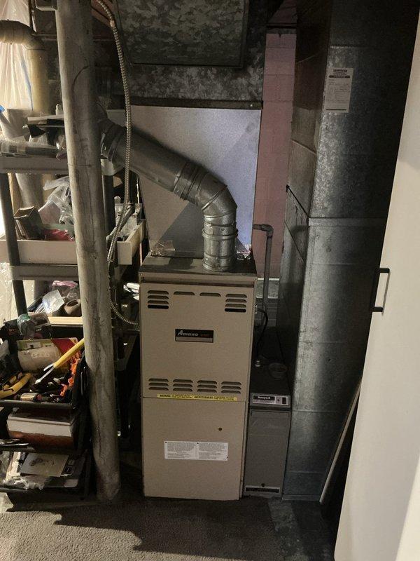 Provided comprehensive air conditioning replacement estimate for 26-year-old Amana unit that has reached end of expected service life. Documented existing HVAC system configuration in basement utility area, including current air handler setup, ductwork connections, and available installation space. Confirmed customer contact information for estimate follow-up and system replacement scheduling.