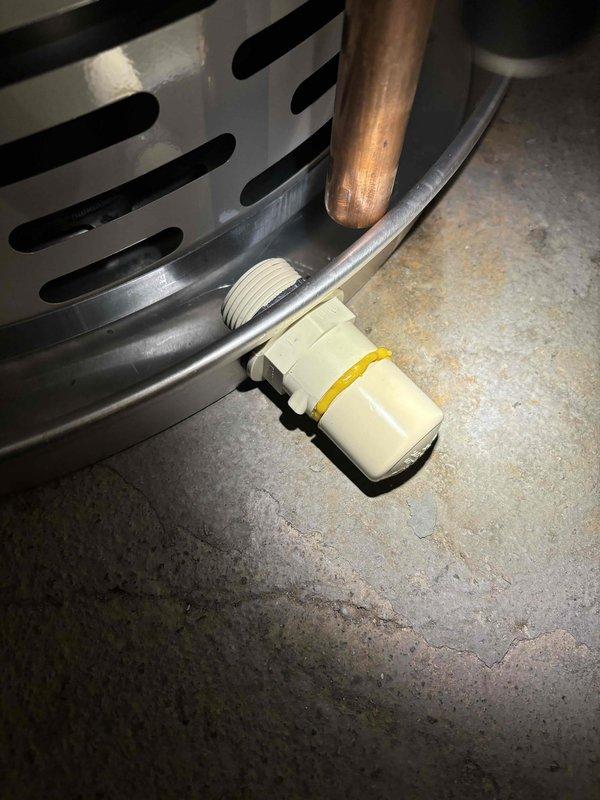 Completed comprehensive AC tune-up on 9-year-old system. Inspected and serviced condensate drain line components, including PVC fittings and drain trap assembly. All system components operating within normal parameters, no issues identified during inspection.