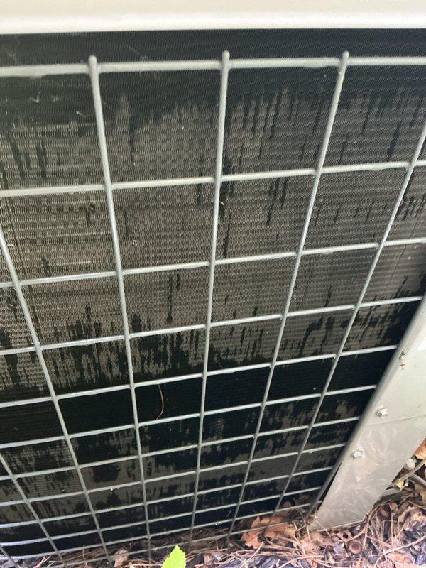 Completed annual cooling system maintenance and inspection. Serviced condensate pump and drainage system in utility closet, verified proper operation and drainage flow. Inspected outdoor condenser unit and noted heavy dirt and debris accumulation on coil fins requiring attention. Documented system conditions with photographs for maintenance records.