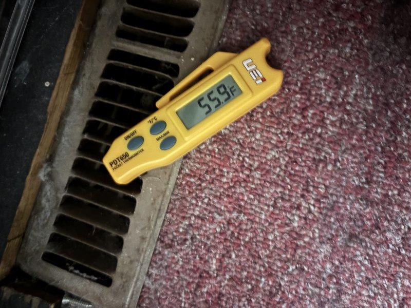 Responded to no cooling complaint on 1-year-old Carrier system with thermostat set to 70°F but home temperature at 78°F. Upon arrival, confirmed warm air discharge from supply registers. Performed temperature measurements at multiple supply vents throughout the home, recording discharge air temperatures of 52.3°F and 55.8°F, which indicated the system was producing cooled air but insufficient for the load or airflow issues were present. Conducted system diagnostics to identify root cause of inadequate cooling performance. Documented findings with thermal measurements at floor registers to verify air temperatures being delivered to conditioned space.
