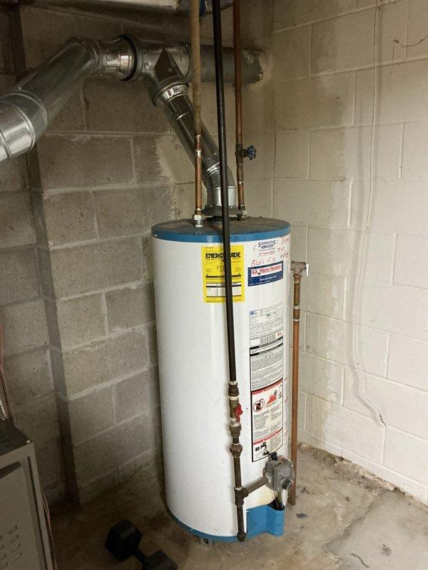 Conducted on-site evaluation of existing 16-year-old residential water heater for replacement estimate. Assessed current installation including copper supply lines, shut-off valves, temperature and pressure relief valve with discharge piping, and venting configuration. Documented equipment specifications, plumbing connections, and utility room conditions to provide accurate replacement proposal qualifying for utility rebate program.