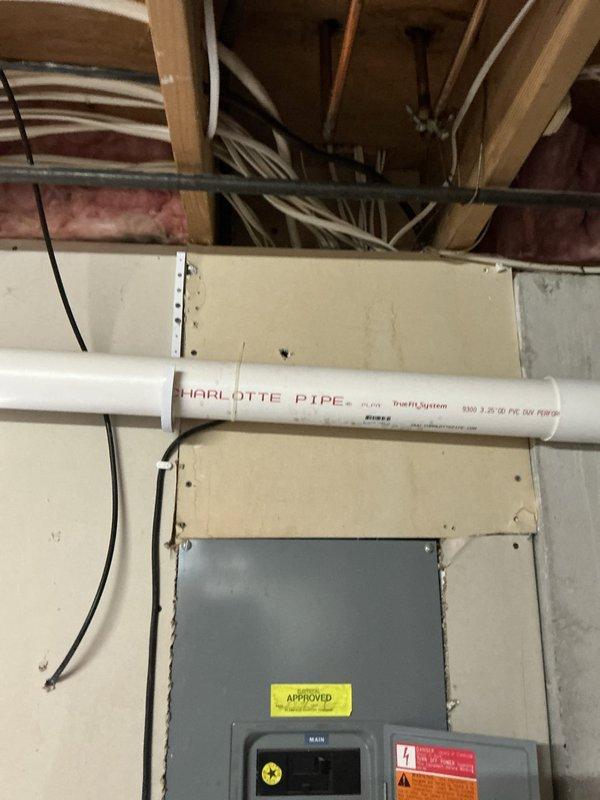 Conducted comprehensive evaluation of 15-year-old HVAC system experiencing inadequate cooling performance and insufficient airflow to remote areas of the home. Assessed outdoor condensing unit condition, noting vegetation growth and environmental factors affecting equipment performance, and inspected indoor furnace components, ductwork, and electrical systems in basement utility area. Provided detailed estimate for furnace and air conditioning replacement options to address airflow deficiencies and restore proper heating and cooling capacity throughout the residence, with additional consideration for water heater replacement needs.