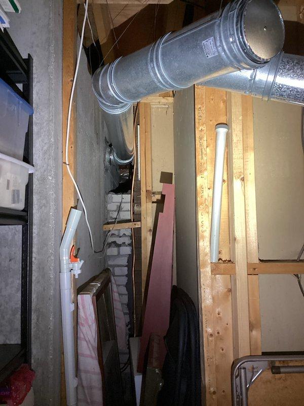 Provided estimate for replacement of 16-year-old water heater with new Bradford White 40-gallon unit. Assessed installation site in basement utility area, documented existing conditions including ductwork clearances and structural layout, and photographed current setup to determine proper installation requirements and specifications for the proposed water heater replacement.