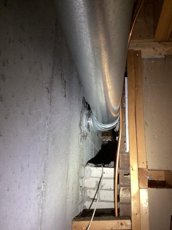 Provided estimate for replacement of 16-year-old water heater with new Bradford White 40-gallon unit. Assessed installation site in basement utility area, documented existing conditions including ductwork clearances and structural layout, and photographed current setup to determine proper installation requirements and specifications for the proposed water heater replacement.