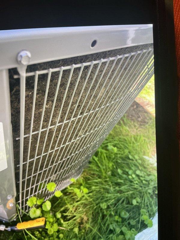Responded to cooling complaint on 2023 Carrier WT 11-2030 system unable to reach thermostat setpoint of 66°F, maintaining only 78°F throughout home. Upon inspection, discovered outdoor condenser coil heavily obstructed with dust and debris accumulation on fins, significantly restricting airflow and reducing heat transfer efficiency. Cleaned condenser coil thoroughly, restoring proper airflow through heat exchanger. Verified system operation, confirmed unit now achieving proper temperature differential and cycling appropriately to reach desired setpoint.